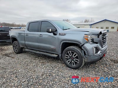 Czwarte zdjęcie samochodu z boku: 2019 GMC SIERRA K1500 AT4 VIN:1GTP9EED8KZ397193 - miniatura