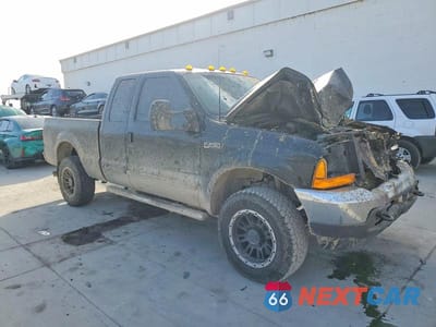 Czwarte zdjęcie samochodu z boku: 2001 FORD F250 SUPER DUTY VIN:1FTNX21F11EB56987 - miniatura