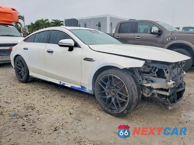 Czwarte zdjęcie samochodu z boku: 2022 MERCEDES-BENZ AMG GT 43 VIN:W1K7X5KBXNA050241 - miniatura