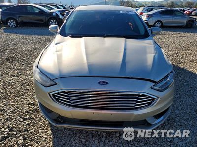 Piąte zdjęcie samochodu w środku: 2017 FORD FUSION SE HYBRID VIN:3FA6P0LUXHR144709 - miniatura
