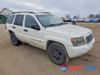 Czwarte zdjęcie samochodu z boku: 2004 JEEP GRAND CHEROKEE LAREDO VIN:1J4GW48S24C350027 - miniatura