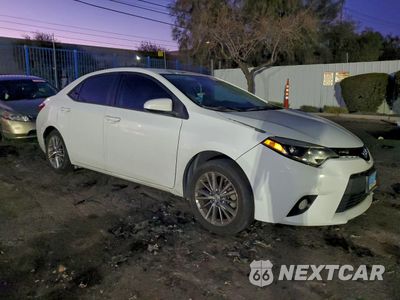 Czwarte zdjęcie samochodu z boku: 2014 TOYOTA COROLLA L VIN:5YFBURHE7EP112468 - miniatura
