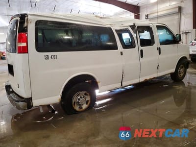 Trzecie zdjęcie samochodu z tyłu: 2013 CHEVROLET EXPRESS G3500 LS VIN:1GNZGZBG5D1124659 - miniatura