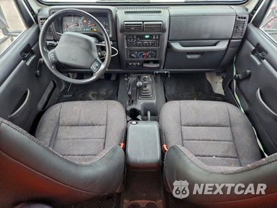 Zdjęcie 8 z 12 samochodu: 2002 JEEP WRANGLER / TJ SPORT VIN:1J4FA49S32P705060 - miniatura