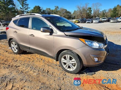 Czwarte zdjęcie samochodu z boku: 2013 HYUNDAI TUCSON GLS VIN:KM8JU3AC3DU726321 - miniatura