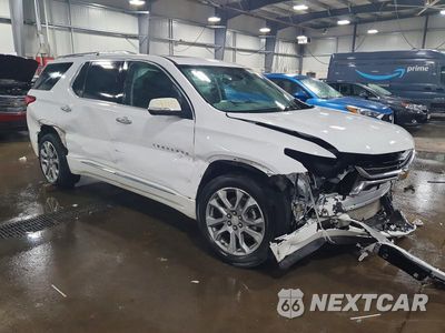 Czwarte zdjęcie samochodu z boku: 2021 CHEVROLET TRAVERSE PREMIER VIN:1GNEVKKW0MJ120733 - miniatura