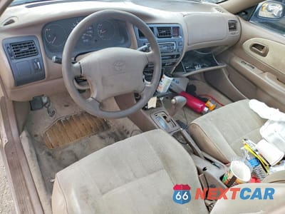 Zdjęcie 8 z 12 samochodu: 1997 TOYOTA COROLLA BASE VIN:1NXBA02E1VZ649994 - miniatura