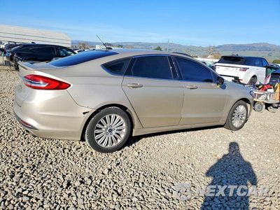 Trzecie zdjęcie samochodu z tyłu: 2017 FORD FUSION SE HYBRID VIN:3FA6P0LUXHR144709 - miniatura