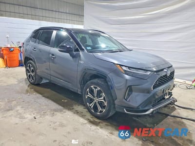 Czwarte zdjęcie samochodu z boku: 2024 TOYOTA RAV4 PRIME XSE VIN:JTMFB3FV3RD192691 - miniatura