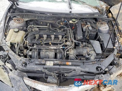 Zdjęcie 11 z 12 samochodu: 2007 MAZDA 3 I VIN:JM1BK32FX71756221 - miniatura