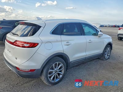 Trzecie zdjęcie samochodu z tyłu: 2015 LINCOLN MKC VIN:5LMCJ1A94FUJ19967 - miniatura