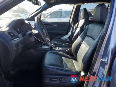 Zdjęcie 7 z 13 samochodu: 2021 HONDA PASSPORT ELITE VIN:5FNYF8H01MB026554 - miniatura