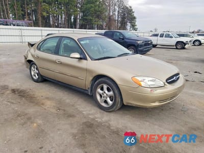 Czwarte zdjęcie samochodu z boku: 2000 FORD TAURUS LX VIN:1FAFP53U3YA232203 - miniatura