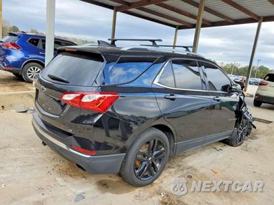 Trzecie zdjęcie samochodu z tyłu: 2020 CHEVROLET EQUINOX LT VIN:2GNAXLEXXL6145699 - miniatura