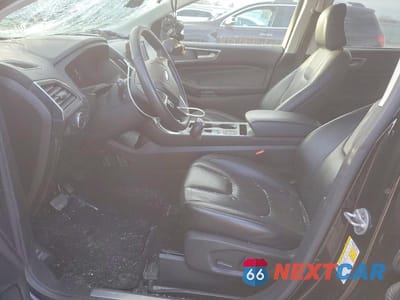 Zdjęcie 7 z 11 samochodu: 2022 FORD EDGE TITANIUM VIN:2FMPK4K98NBA45507 - miniatura