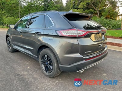 Trzecie zdjęcie samochodu z tyłu: 2016 FORD EDGE SEL VIN:2FMPK3J81GBB95299 - miniatura