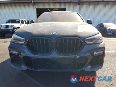Piąte zdjęcie samochodu w środku: 2021 BMW X6 M50I VIN:5UXCY8C09M9E39040 - miniatura