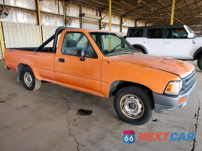 Czwarte zdjęcie samochodu z boku: 1989 TOYOTA PICKUP 1 TON LONG BED DLX VIN:JT4VN82N4K0000052 - miniatura