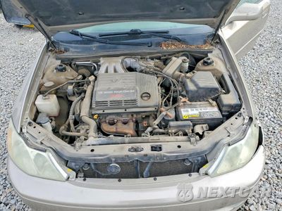 Zdjęcie 11 z 12 samochodu: 2004 TOYOTA AVALON XL VIN:4T1BF28B74U346422 - miniatura
