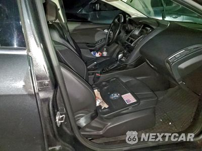 Zdjęcie 13 z 14 samochodu: 2016 FORD FOCUS TITANIUM VIN:1FADP3N2XGL374784 - miniatura