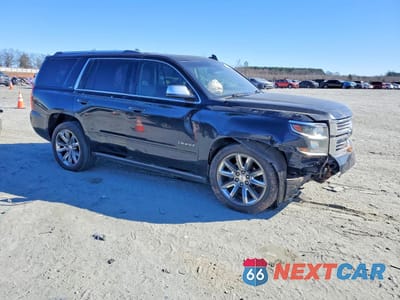 Czwarte zdjęcie samochodu z boku: 2016 CHEVROLET TAHOE K1500 LTZ VIN:1GNSKCKC5GR210005 - miniatura