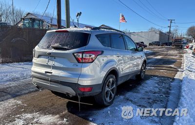 Czwarte zdjęcie samochodu z boku: 2018 FORD ESCAPE SEL VIN:1FMCU9HD8JUC66420 - miniatura