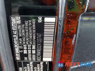 Zdjęcie 12 z 12 samochodu: 2002 MERCEDES-BENZ G 500 VIN:WDCYR49E02X133747 - miniatura