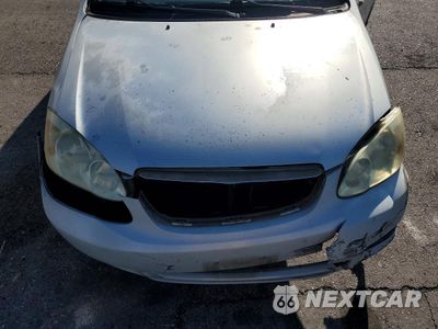 Zdjęcie 11 z 14 samochodu: 2003 TOYOTA COROLLA CE VIN:1NXBR32EX3Z096401 - miniatura