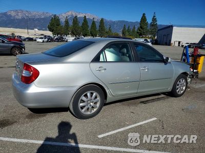 Trzecie zdjęcie samochodu z tyłu: 2002 TOYOTA CAMRY LE VIN:JTDBF30K620005894 - miniatura