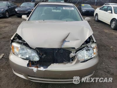 Zdjęcie 11 z 13 samochodu: 2004 TOYOTA COROLLA CE VIN:2T1BR32E34C243516 - miniatura
