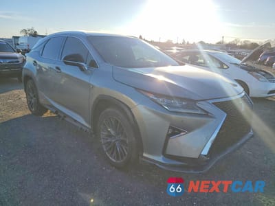 Czwarte zdjęcie samochodu z boku: 2019 LEXUS RX 450H BASE VIN:2T2BGMCA0KC039353 - miniatura
