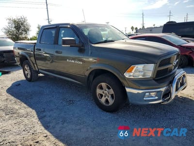 Czwarte zdjęcie samochodu z boku: 2012 DODGE RAM 1500 SLT VIN:1C6RD7LP7CS176296 - miniatura