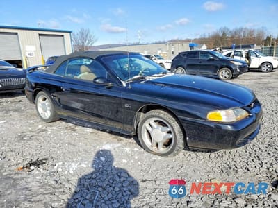 Czwarte zdjęcie samochodu z boku: 1994 FORD MUSTANG GT VIN:1FALP45T4RF189349 - miniatura