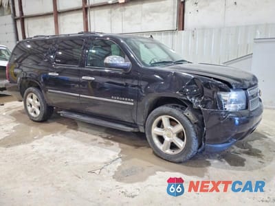 Czwarte zdjęcie samochodu z boku: 2014 CHEVROLET SUBURBAN K1500 LTZ VIN:1GNSKKE7XER135355 - miniatura