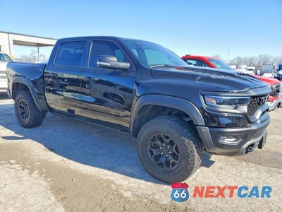 Czwarte zdjęcie samochodu z boku: 2021 RAM 1500 TRX VIN:1C6SRFU96MN781696 - miniatura