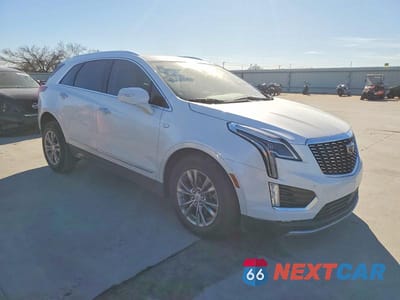Czwarte zdjęcie samochodu z boku: 2021 CADILLAC XT5 PREMIUM LUXURY VIN:1GYKNCRS6MZ235370 - miniatura