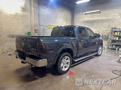 Czwarte zdjęcie samochodu z boku: 2015 RAM 1500 LONGHORN VIN:1C6RR7PM6FS635873 - miniatura