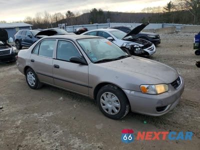 Czwarte zdjęcie samochodu z boku: 2002 TOYOTA COROLLA CE VIN:2T1BR12E02C533004 - miniatura