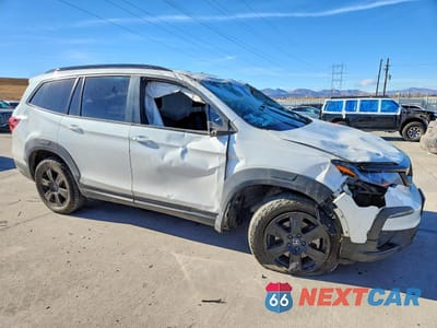 Czwarte zdjęcie samochodu z boku: 2022 HONDA PILOT TRAILSPORT VIN:5FNYF6H85NB044728 - miniatura