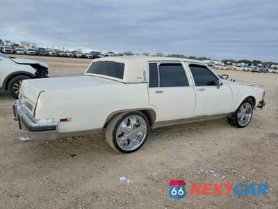 Trzecie zdjęcie samochodu z tyłu: 1984 OLDSMOBILE 98 REGENCY VIN:1G3AG69YXEM807086 - miniatura