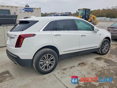 Trzecie zdjęcie samochodu z tyłu: 2023 CADILLAC XT5 PREMIUM LUXURY VIN:1GYKNCR41PZ126210 - miniatura