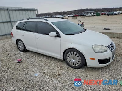 Czwarte zdjęcie samochodu z boku: 2009 VOLKSWAGEN JETTA S VIN:3VWKM71K09M284730 - miniatura