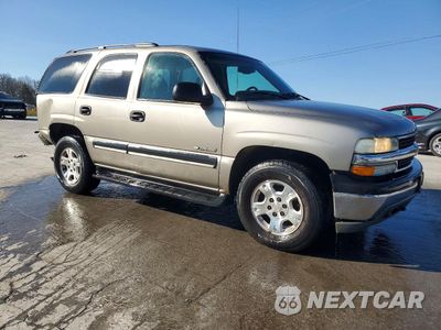 Czwarte zdjęcie samochodu z boku: 2003 CHEVROLET TAHOE K1500 VIN:1GNEK13V03J285477 - miniatura
