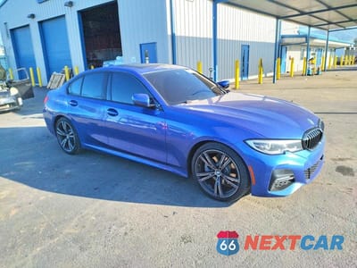 Czwarte zdjęcie samochodu z boku: 2021 BMW 330I VIN:3MW5R1J01M8B99116 - miniatura