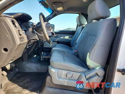 Zdjęcie 7 z 11 samochodu: 2014 FORD F150 VIN:1FTMF1CM5EFA98886 - miniatura