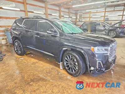 Czwarte zdjęcie samochodu z boku: 2022 GMC ACADIA DENALI VIN:1GKKNXLS9NZ160711 - miniatura