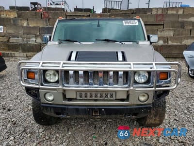 Piąte zdjęcie samochodu w środku: 2004 HUMMER H2 VIN:5GRGN23U04H102723 - miniatura
