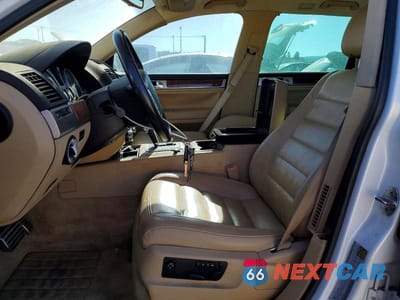 Zdjęcie 7 z 12 samochodu: 2004 VOLKSWAGEN TOUAREG 4.2 VIN:WVGCM77L84D040508 - miniatura