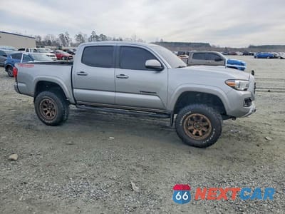 Czwarte zdjęcie samochodu z boku: 2019 TOYOTA TACOMA TRD SPORT VIN:5TFCZ5AN2KX210409 - miniatura