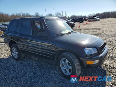 Czwarte zdjęcie samochodu z boku: 2000 TOYOTA RAV4 BASE VIN:JT3GP10V9Y7065464 - miniatura
